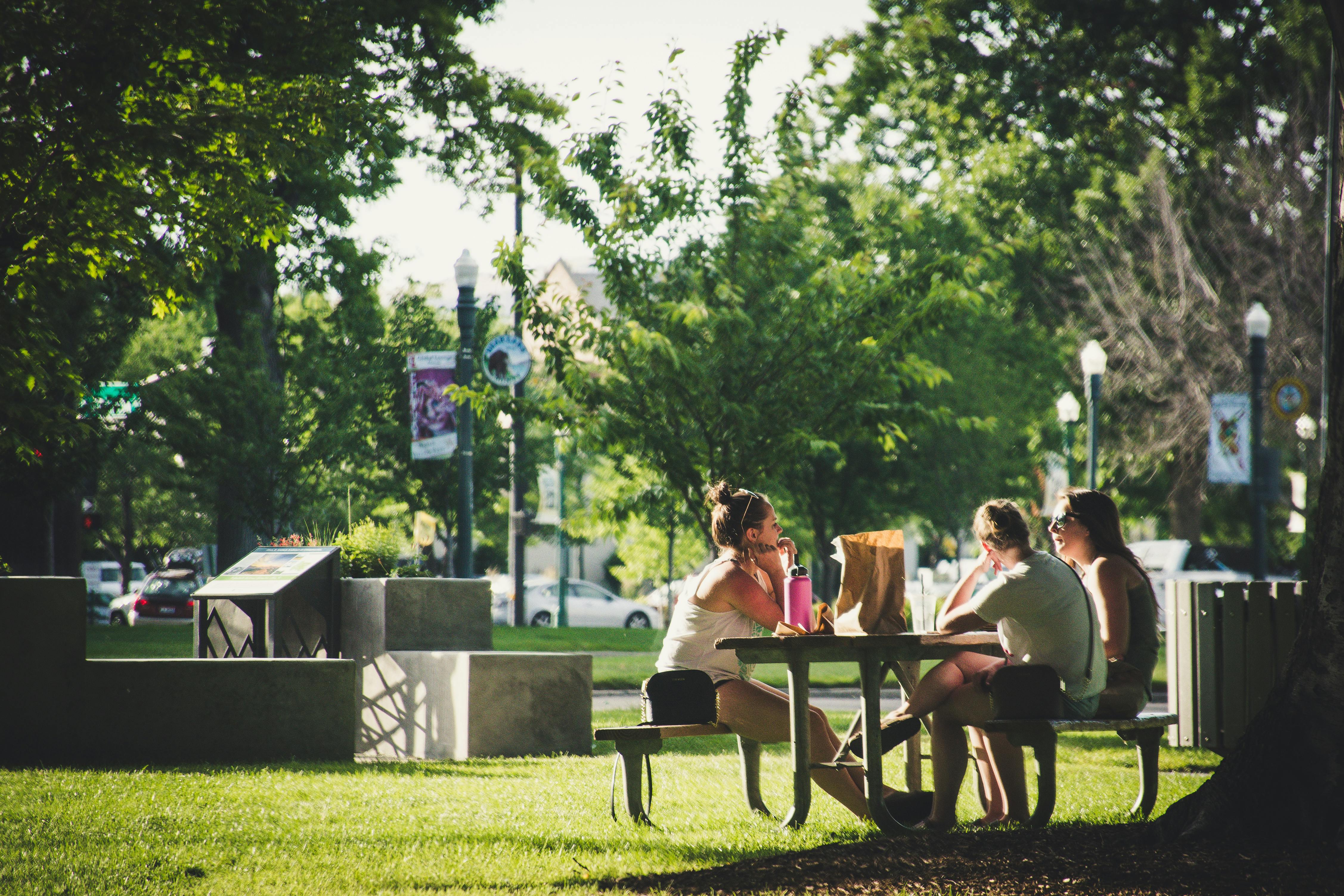 People sitting at a table at Gathering Central.